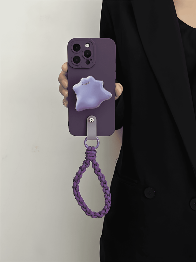 Dunkelviolette Silikonhülle mit Pokémon Ditto Stand geflochtenem Handschlaufe Lanyard