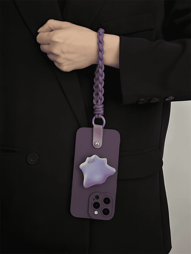 Dunkelviolette Silikonhülle mit Pokémon Ditto Stand geflochtenem Handschlaufe Lanyard